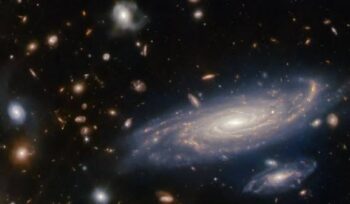 Teleskop Hubble temukan galaksi purba MXDFz4.4 berusia 12 miliar tahun yang mampu membentuk bintang 10 kali lebih cepat dari Bima Sakti.